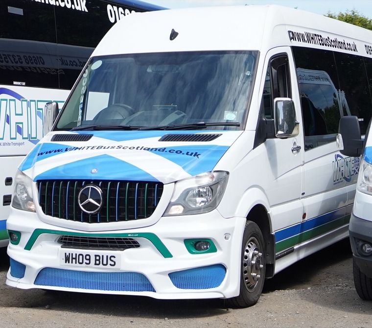 The front of the 16-seat Mercedes minibus, saltire across the bonnet