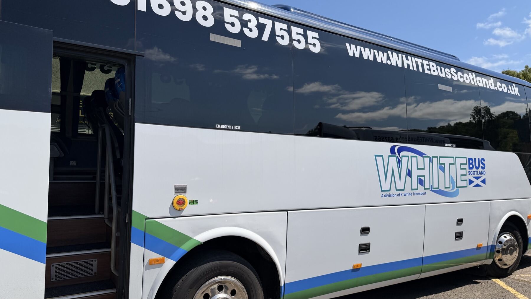 A White Bus Scotland coach in livery, the return coach to The Script
